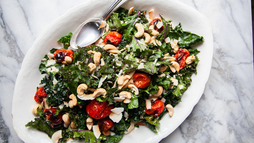 Kale Salad with Burst Tomatoes, Toasted Coconut & Cashews