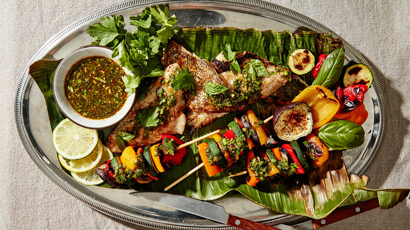 Sea Bass in Banana Leaf with Skewered Summer Vegetables